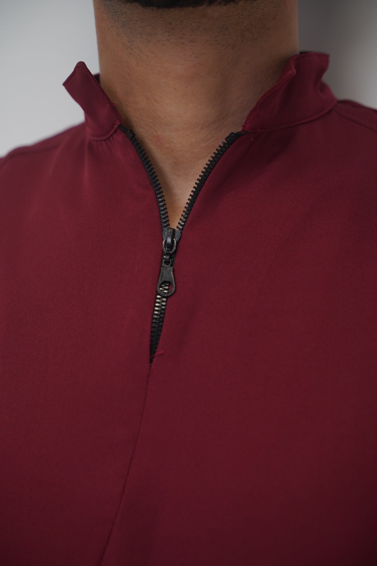 unparalleled scrub in light burgundy