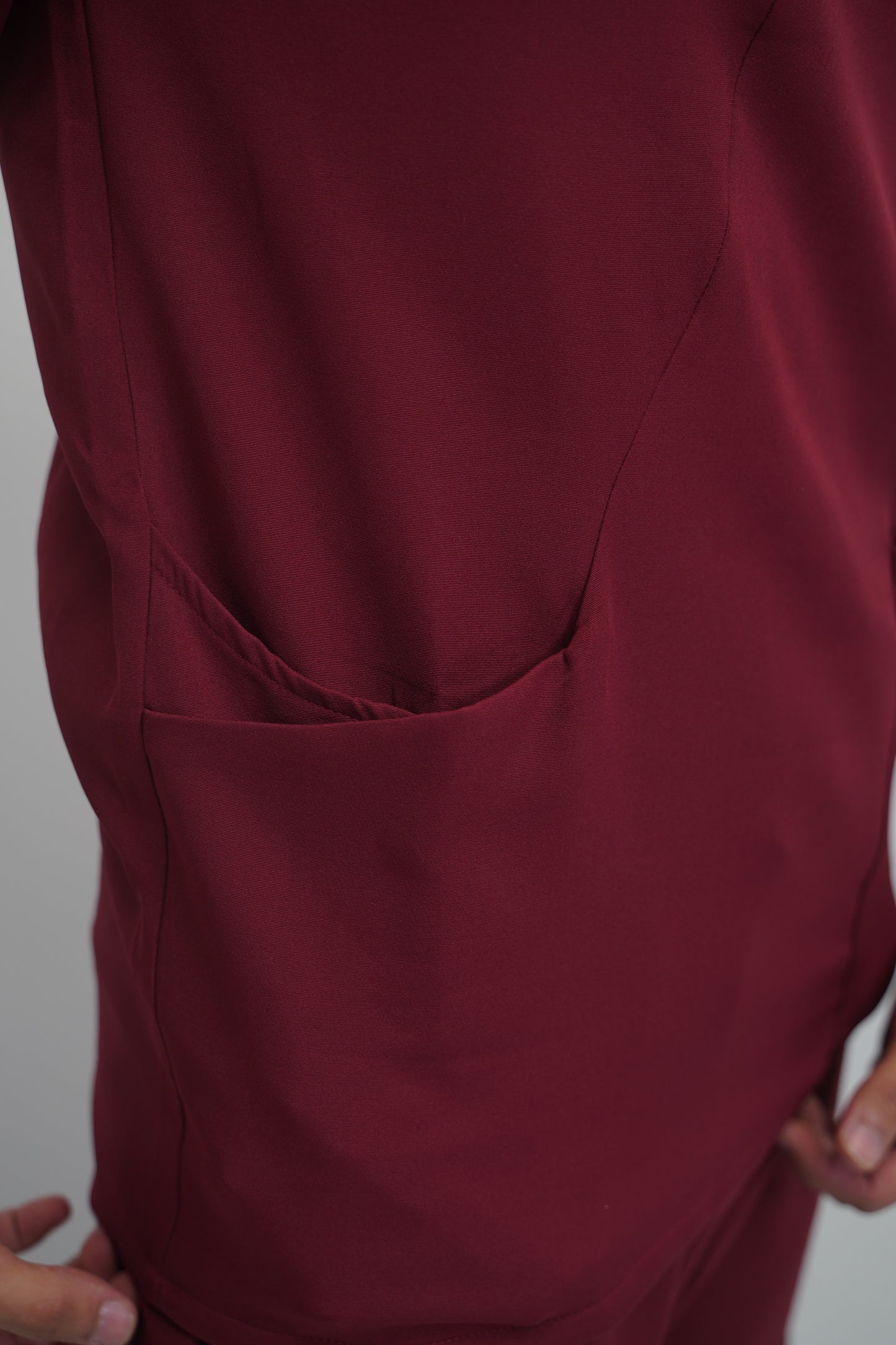 unparalleled scrub in light burgundy