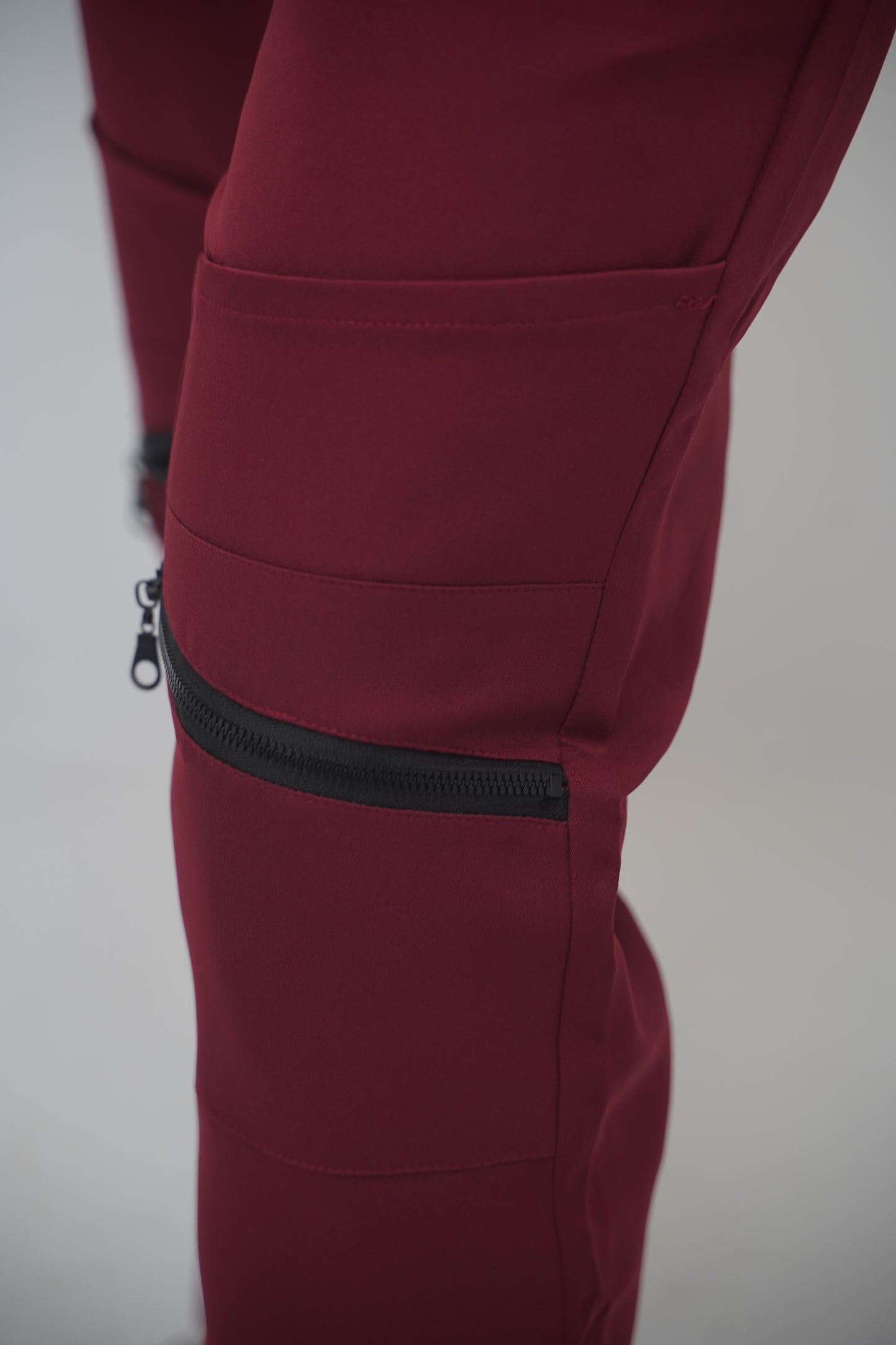 unparalleled scrub in light burgundy