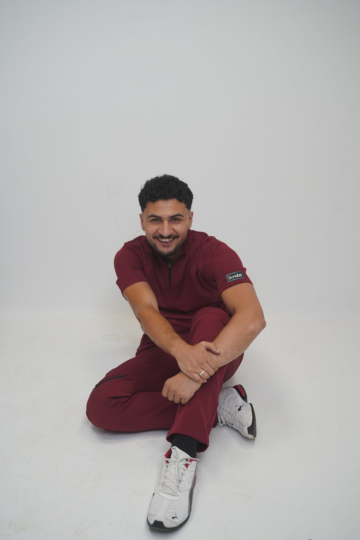 unparalleled scrub in light burgundy