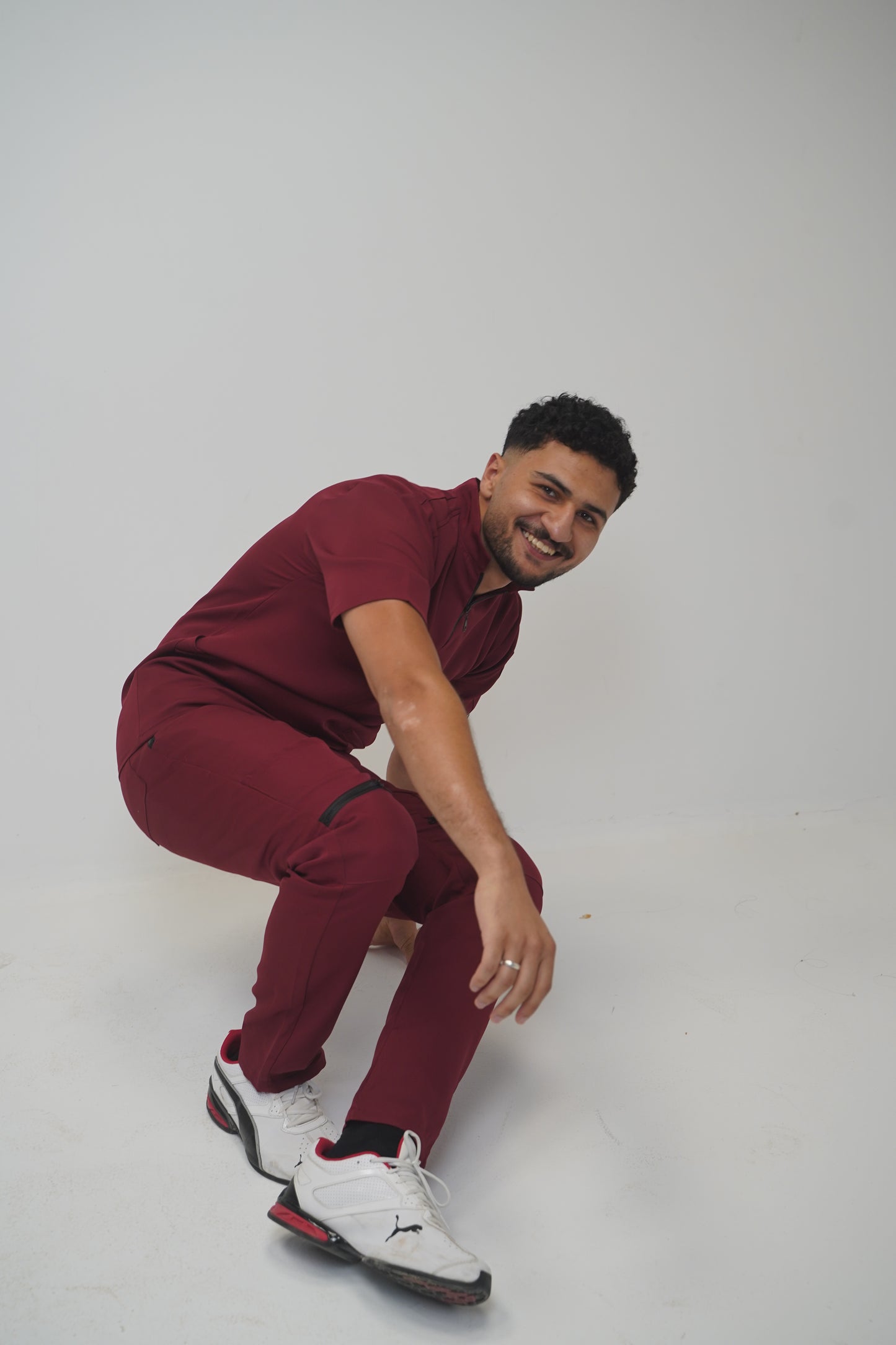 unparalleled scrub in light burgundy